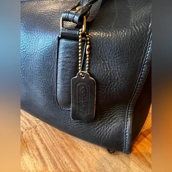 VINTAGE CÓRNER: COACH DESIGNER BONNIE CASHIN Black Leather Handbag with Strap - Picture 11 of 12